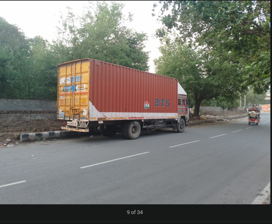 Red container transport truck ready for PAN-India FTL despatch