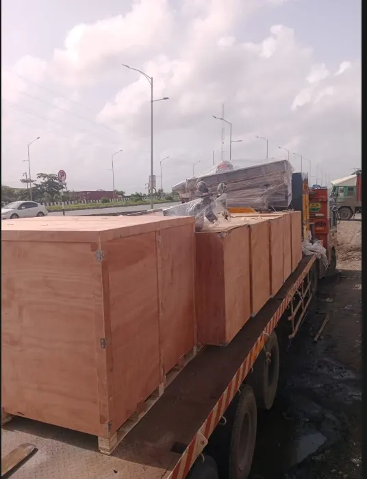 Wooden crates and equipment loaded on an open truck